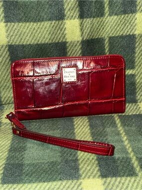 Dooney and Bourke large wristlet in wine